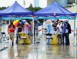 China shortens COVID quarantine time for international travellers